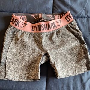 small grey and pink gymshark flex shorts